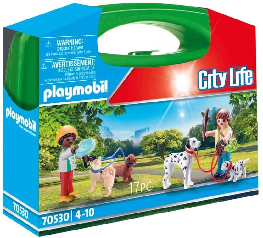 Bambini con cuccioli in valigetta