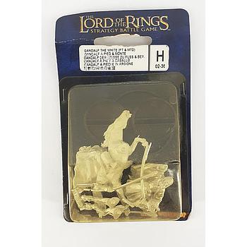 Gandalf il bianco a piedi e in arcione a cavallo