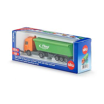 Camion con rimorchio e copertura